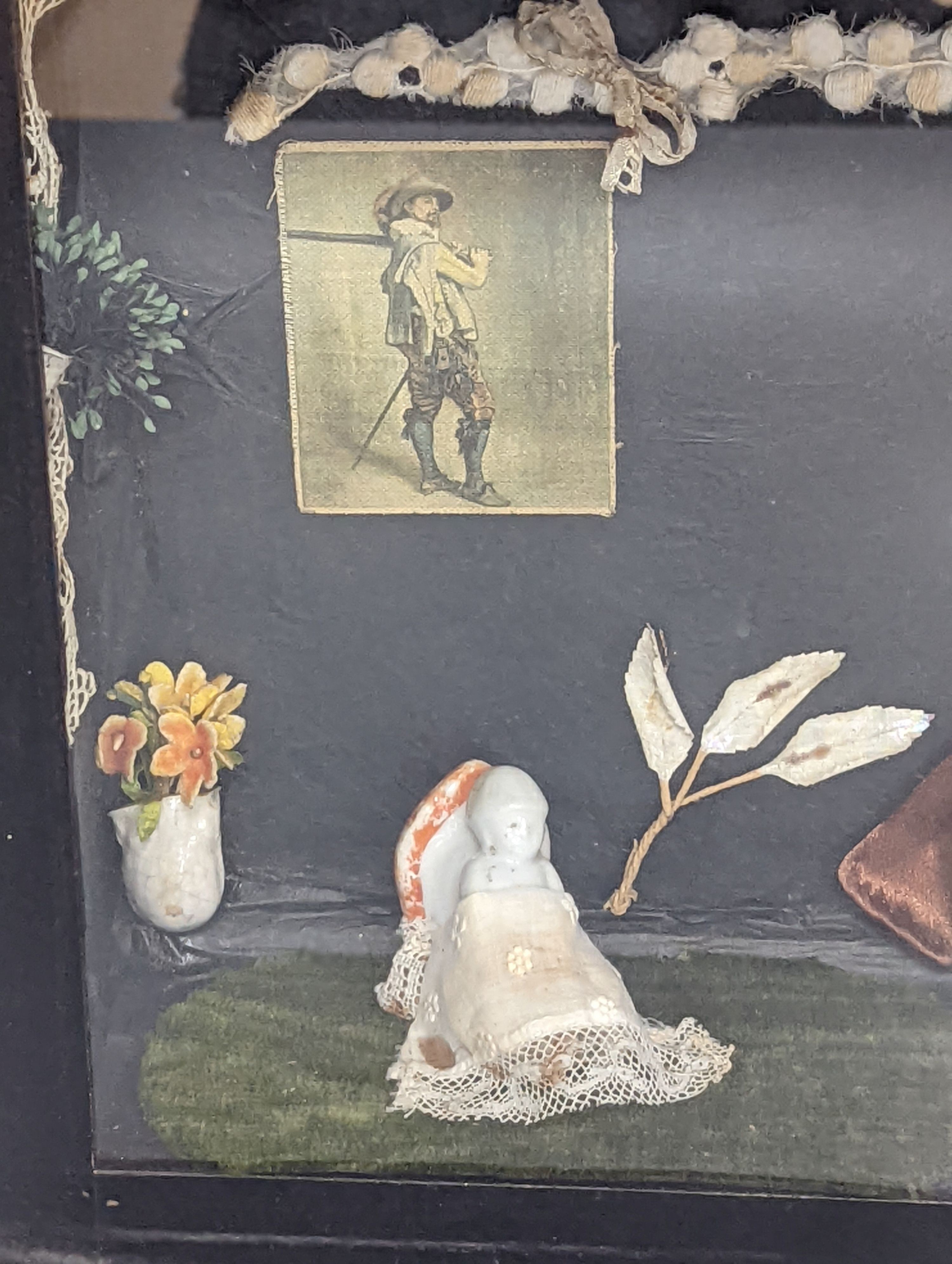 A Diorama, interior scene of Victorian dolls and objects, 38 cm wide